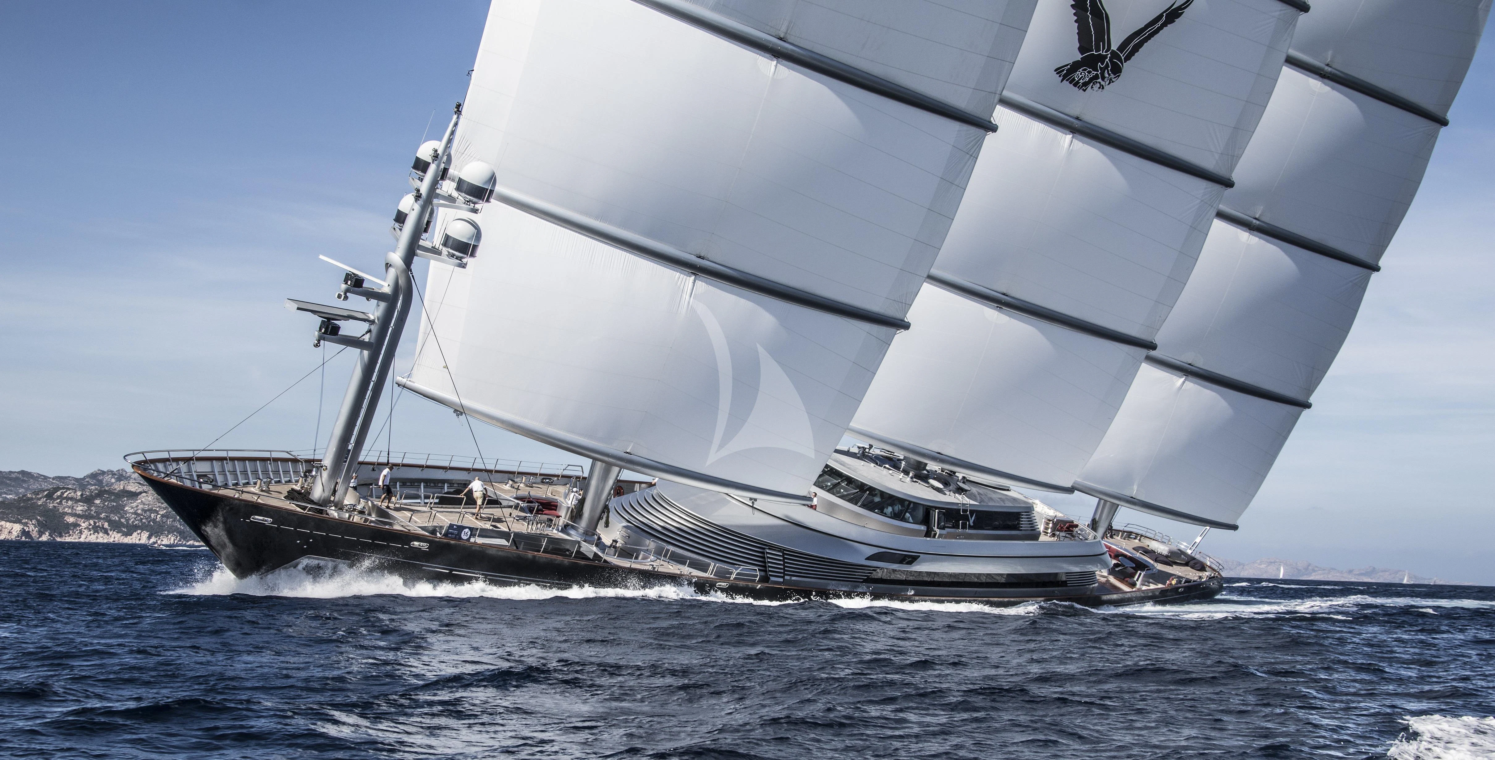 a large white boat on the water aboard MALTESE FALCON Yacht for Sale