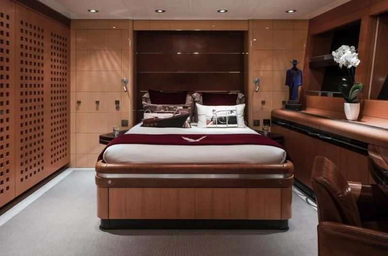 a bed in a room aboard MALTESE FALCON Yacht for Sale