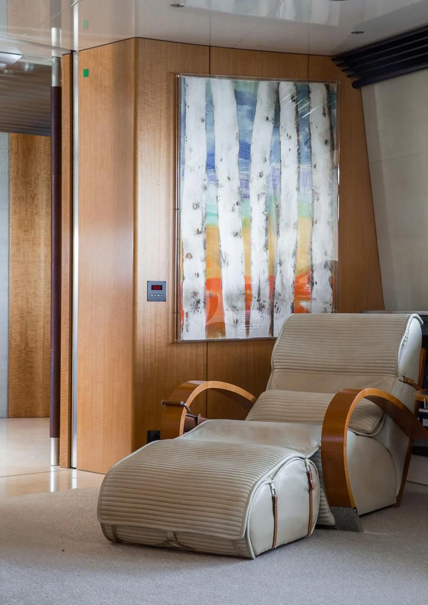 a couple of couches in a room aboard MALTESE FALCON Yacht for Sale