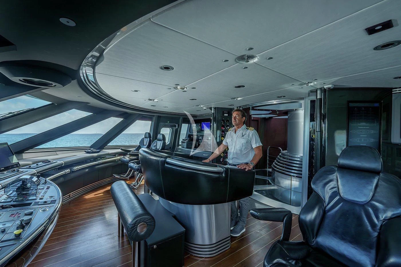 a person standing in a room aboard MALTESE FALCON Yacht for Sale