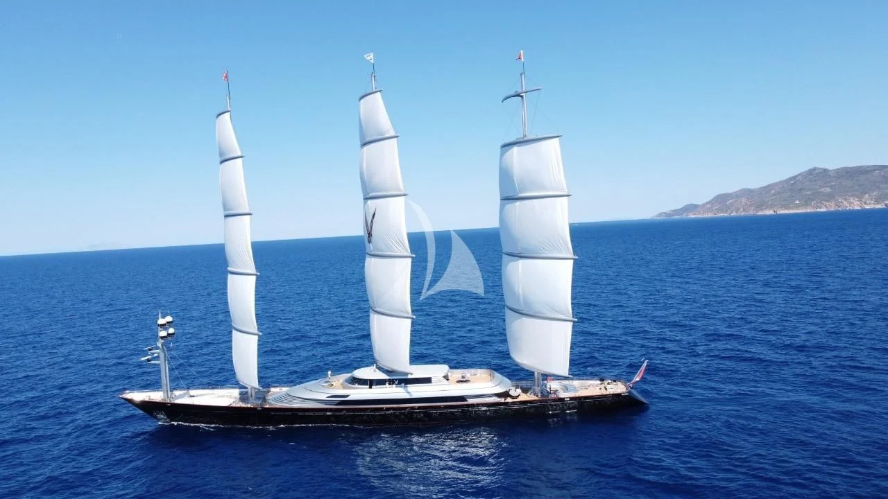 a couple of sailboats on the water aboard MALTESE FALCON Yacht for Sale