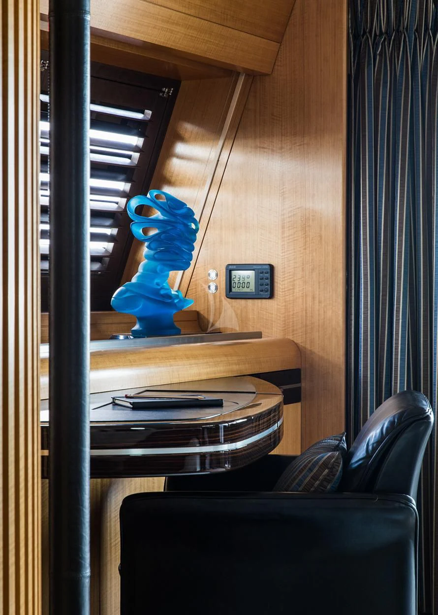 a blue bird on a shelf aboard MALTESE FALCON Yacht for Sale