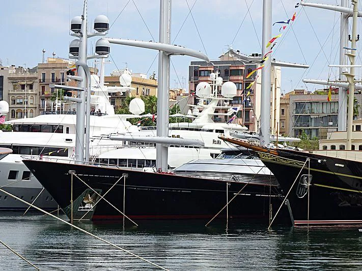 a boat docked in a harbor aboard MALTESE FALCON Yacht for Sale