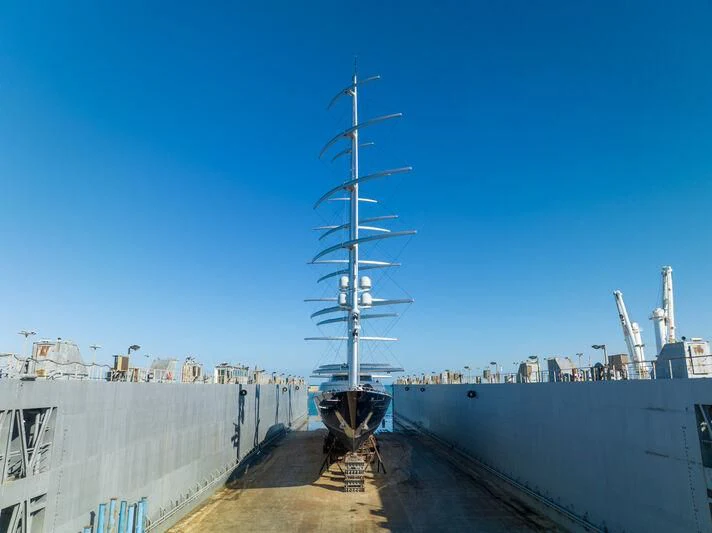 a large ship in a harbor aboard MALTESE FALCON Yacht for Sale
