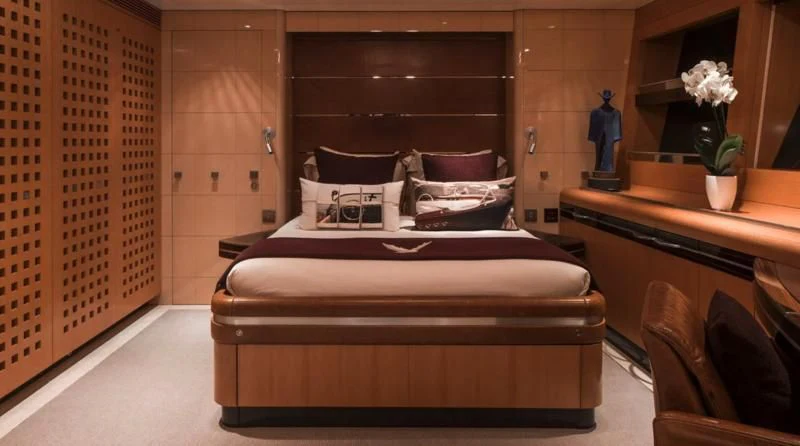 a bed in a room aboard MALTESE FALCON Yacht for Sale