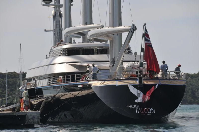 a boat with a flag on the front aboard MALTESE FALCON Yacht for Sale