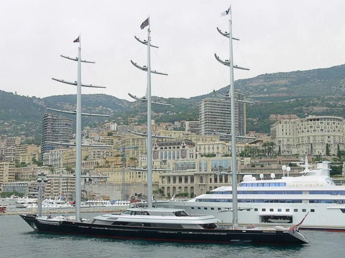a couple of boats sit in a harbor aboard MALTESE FALCON Yacht for Sale