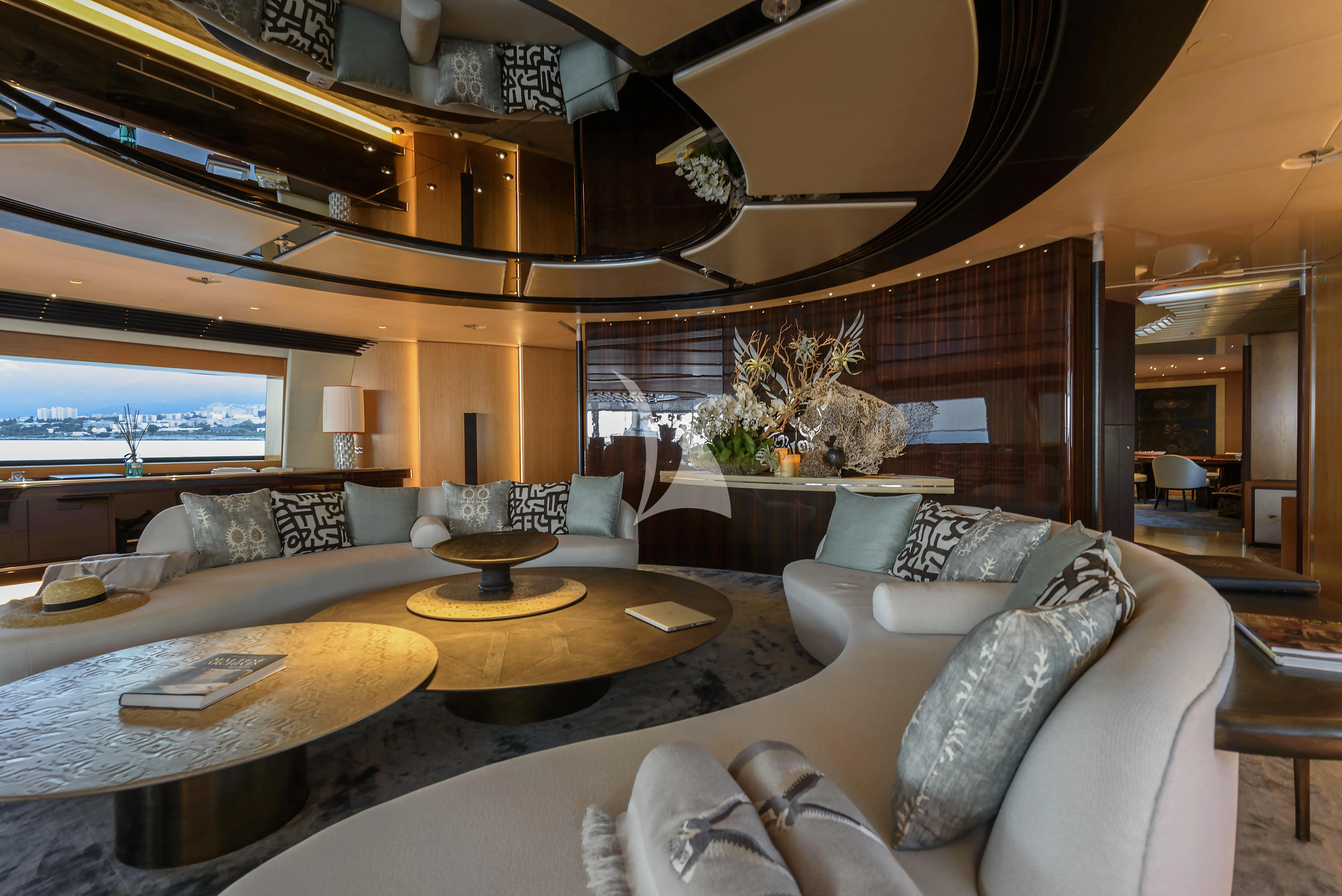 a living room with a large window aboard MALTESE FALCON Yacht for Sale
