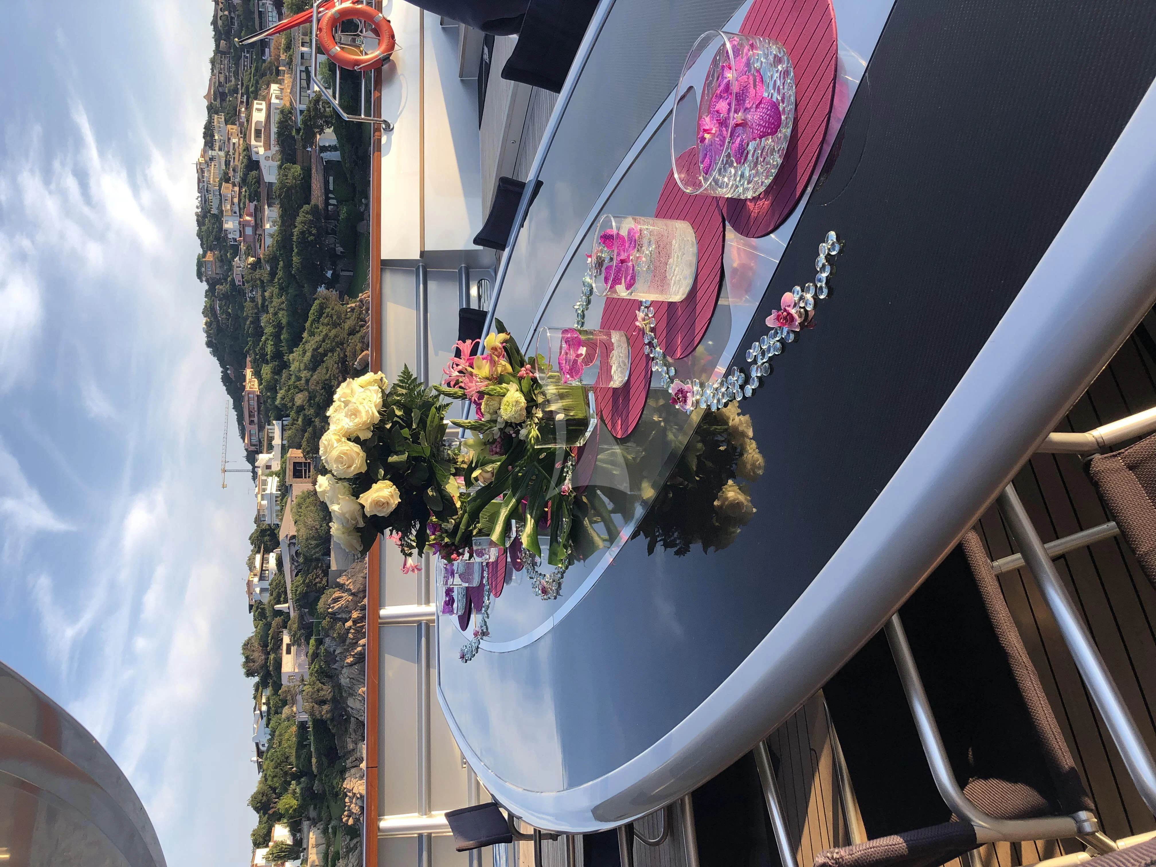 a balcony with flowers aboard MALTESE FALCON Yacht for Sale