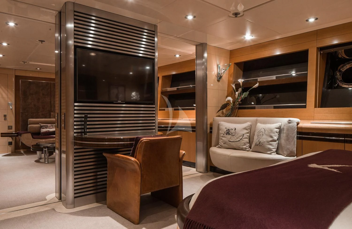 a room with a bed and a tv aboard MALTESE FALCON Yacht for Sale
