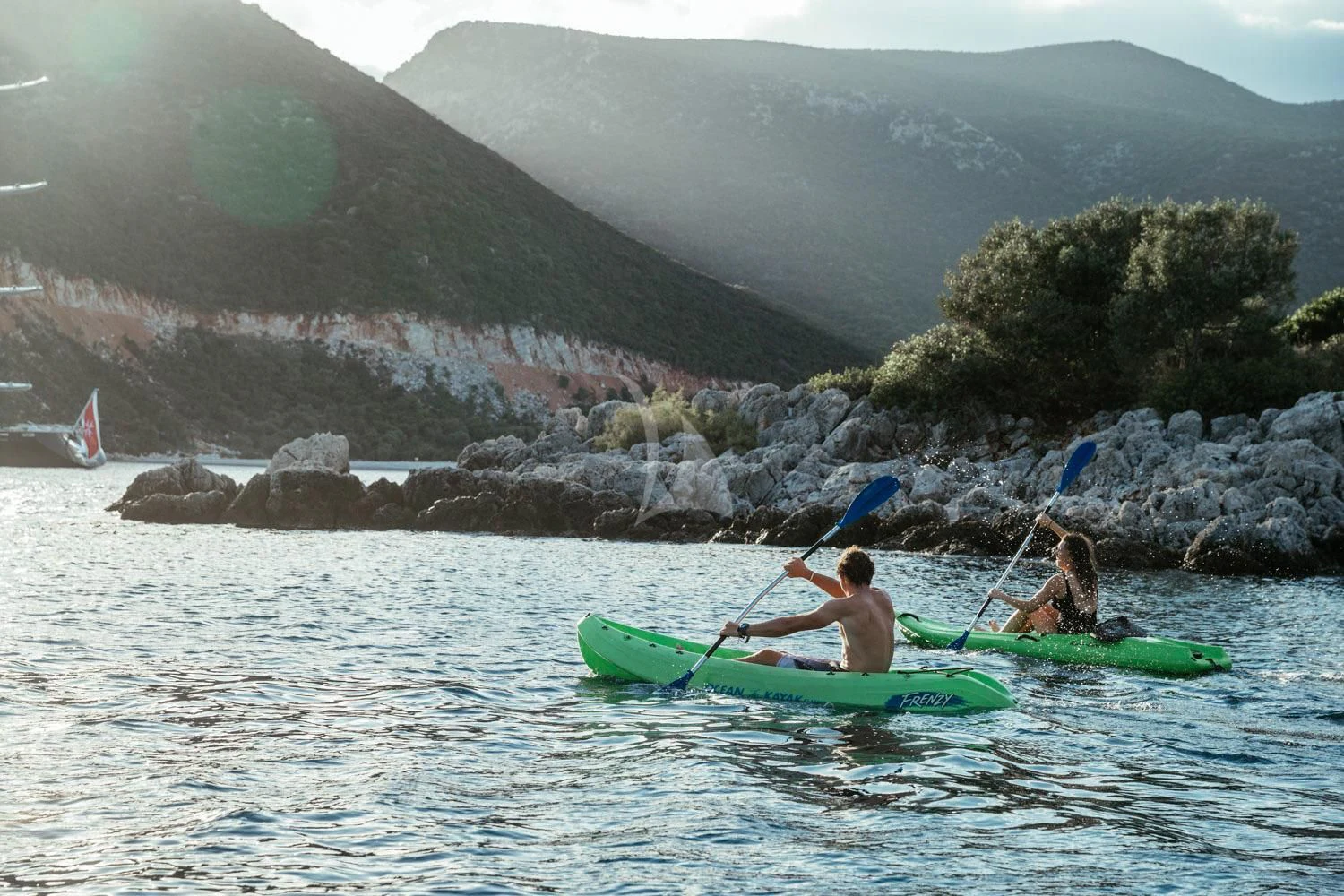 a couple of people in a canoe on the water aboard MALTESE FALCON Yacht for Sale