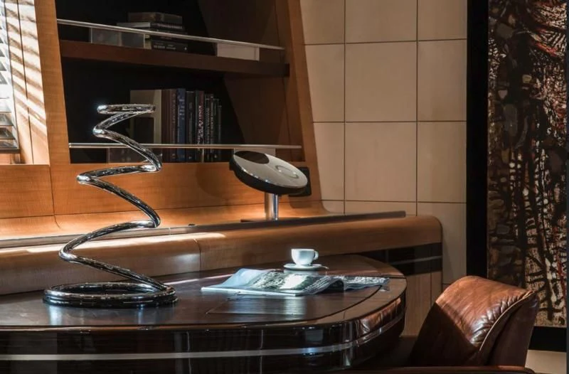 a table with a record player and record player aboard MALTESE FALCON Yacht for Sale