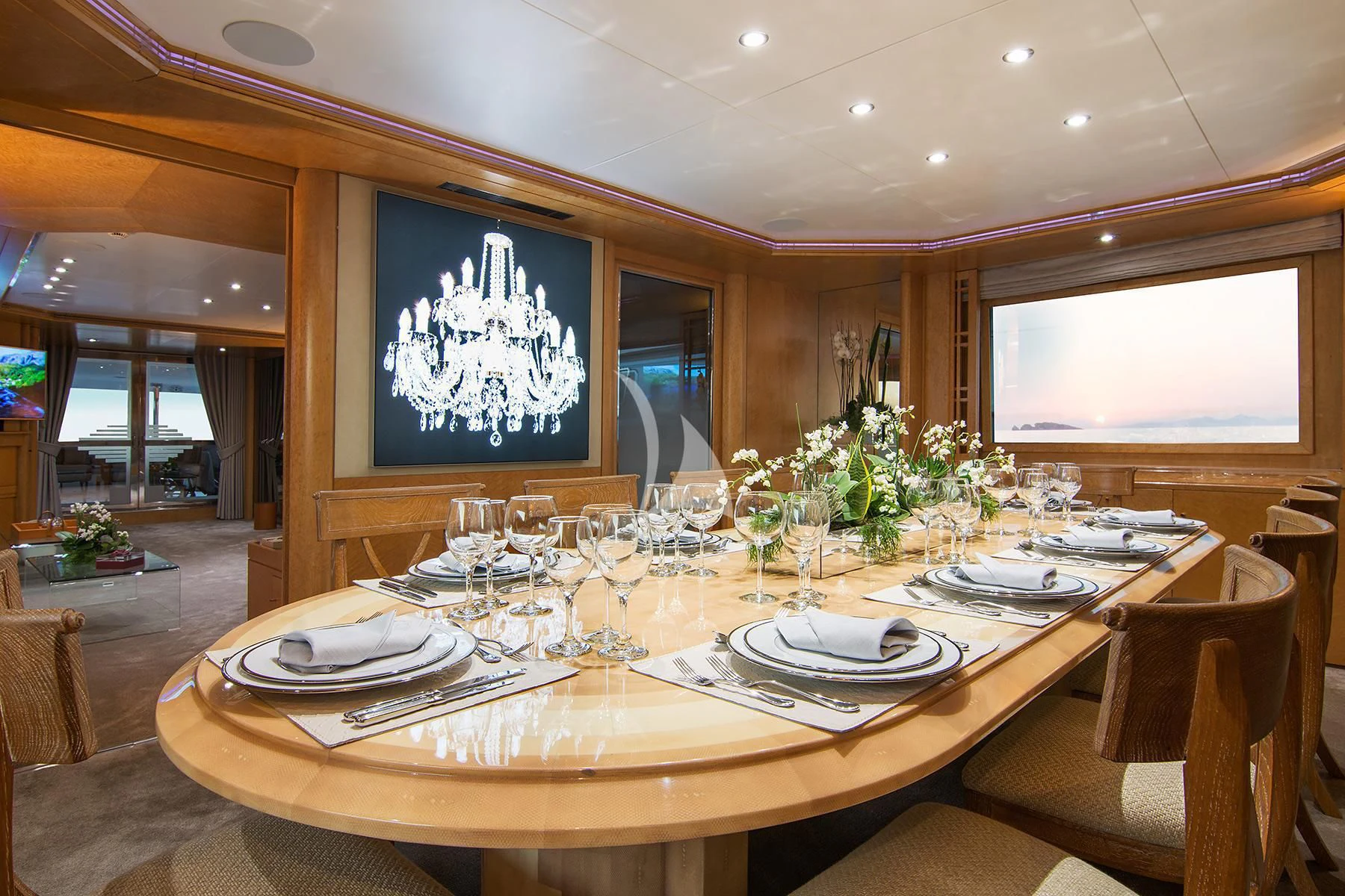 a table with plates and glasses aboard BELLA STELLA Yacht for Charter