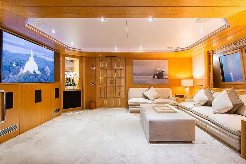 a large living room with a large mirror aboard BELLA STELLA Yacht for Charter