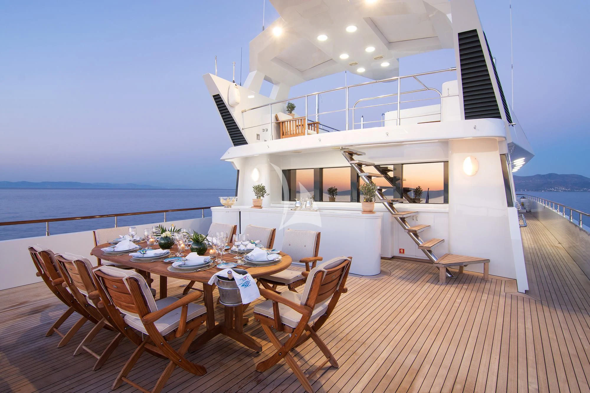 a large white house with a balcony aboard BELLA STELLA Yacht for Charter
