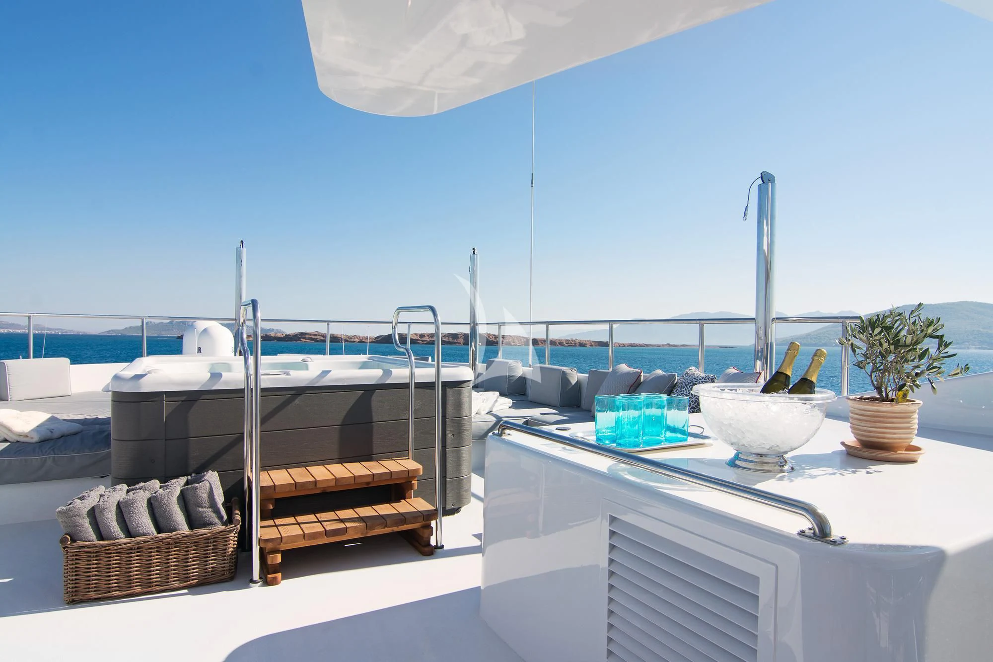 a table with a basket of food on it aboard BELLA STELLA Yacht for Charter
