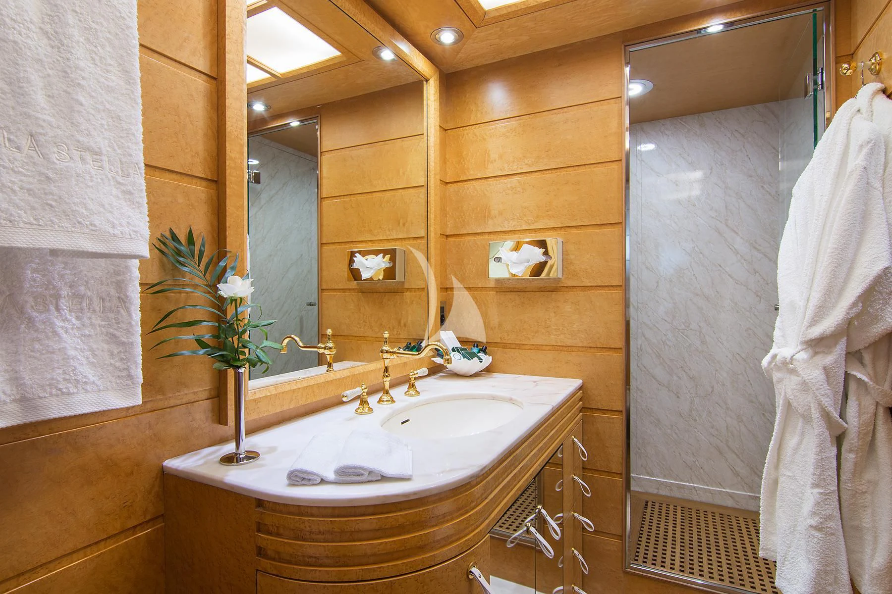 a bathroom with a sink and a mirror aboard BELLA STELLA Yacht for Charter