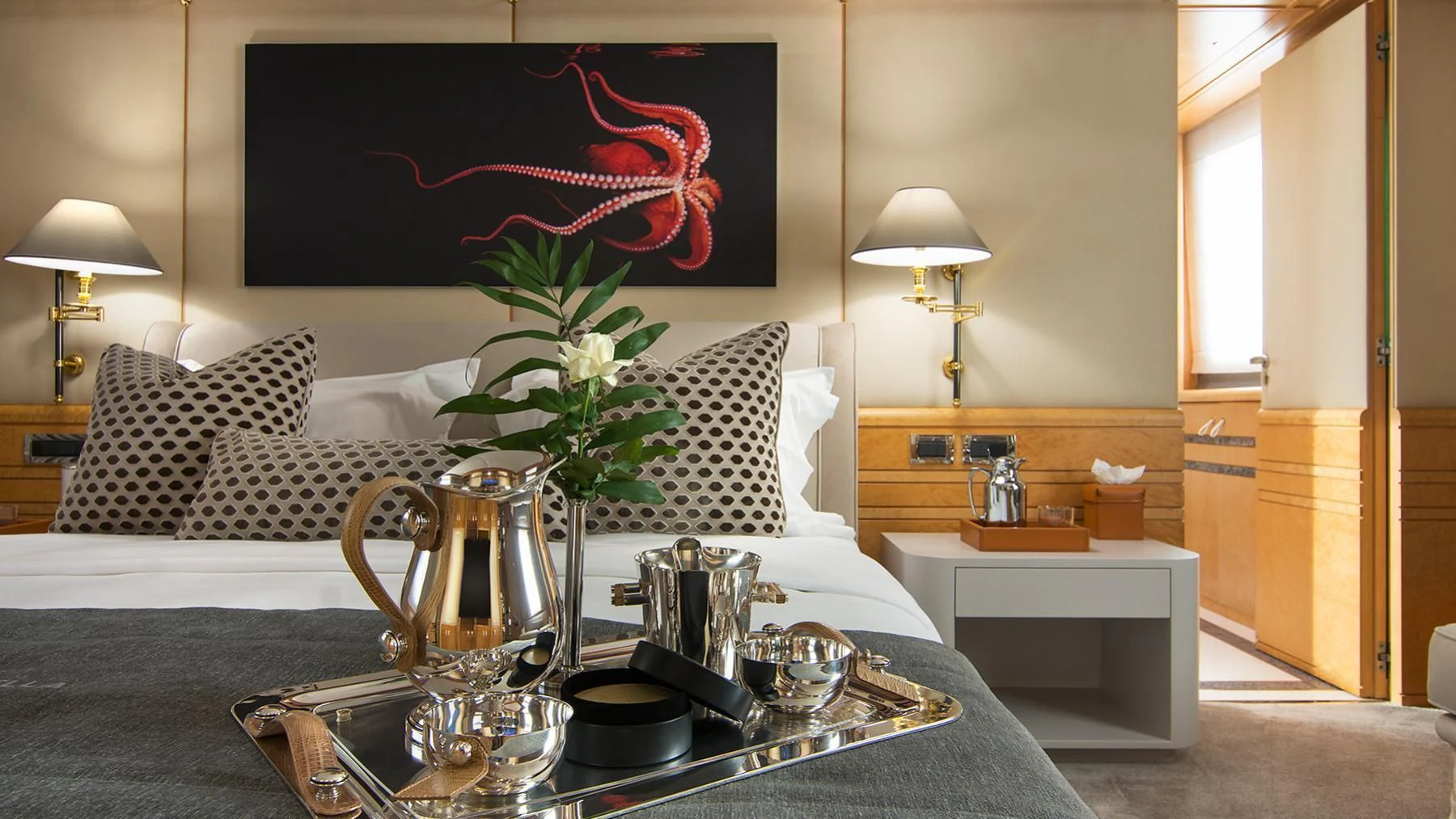 a living room with a bed and coffee table aboard BELLA STELLA Yacht for Charter