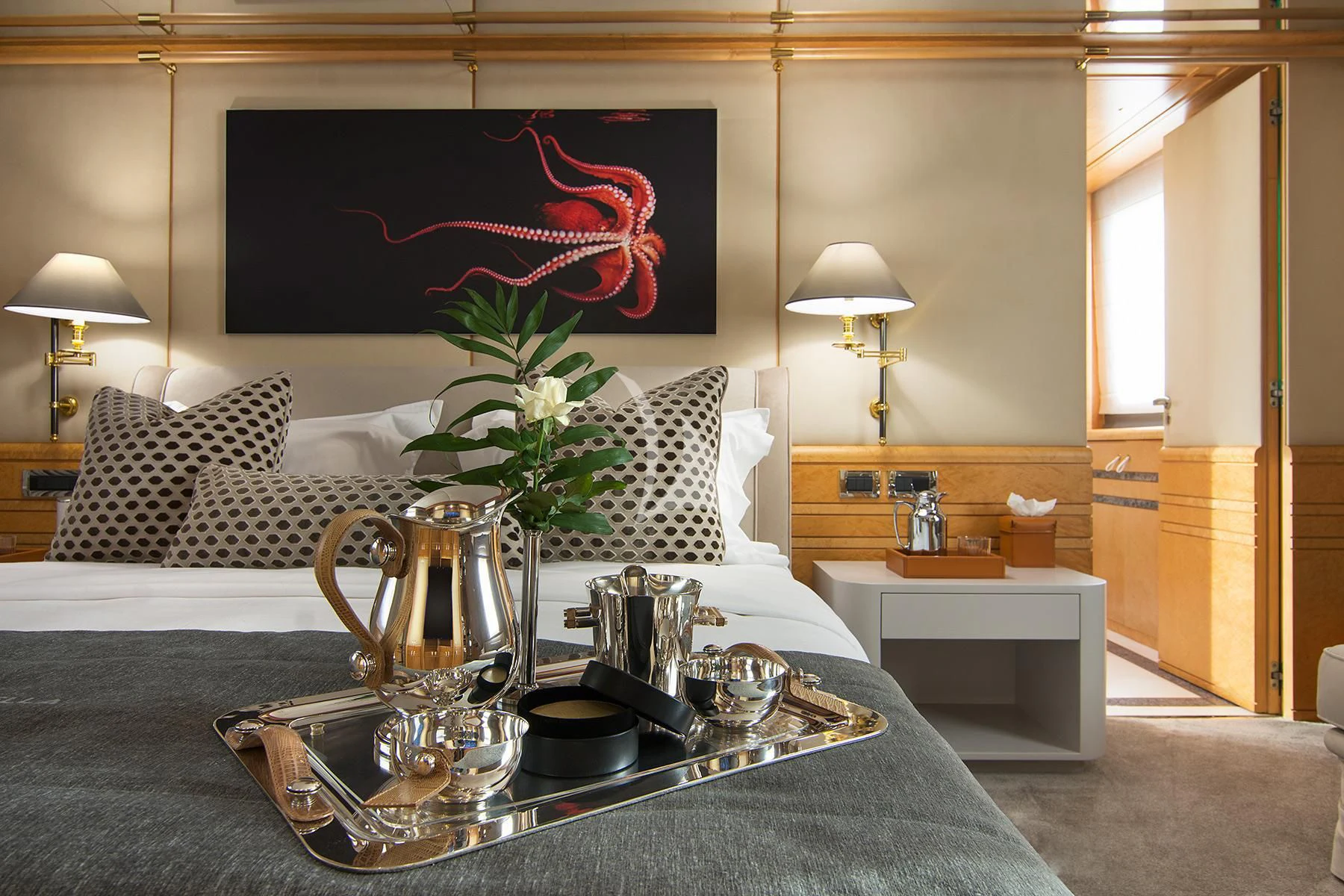 a living room with a large painting aboard BELLA STELLA Yacht for Charter