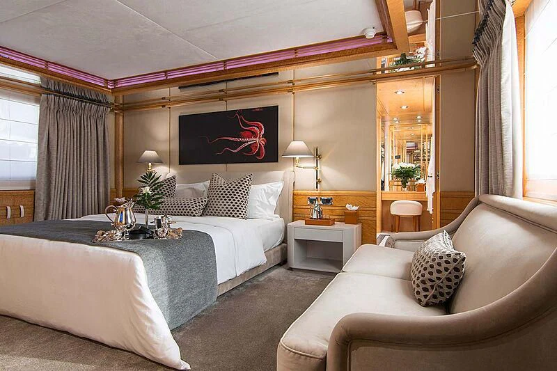 a couple of beds in a hotel room aboard BELLA STELLA Yacht for Charter