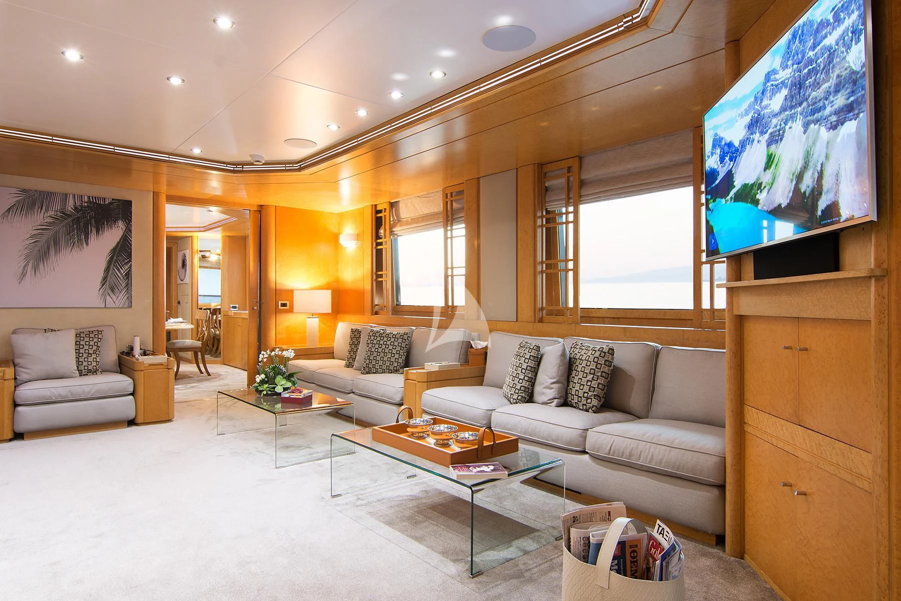 a living room with a large screen aboard BELLA STELLA Yacht for Charter