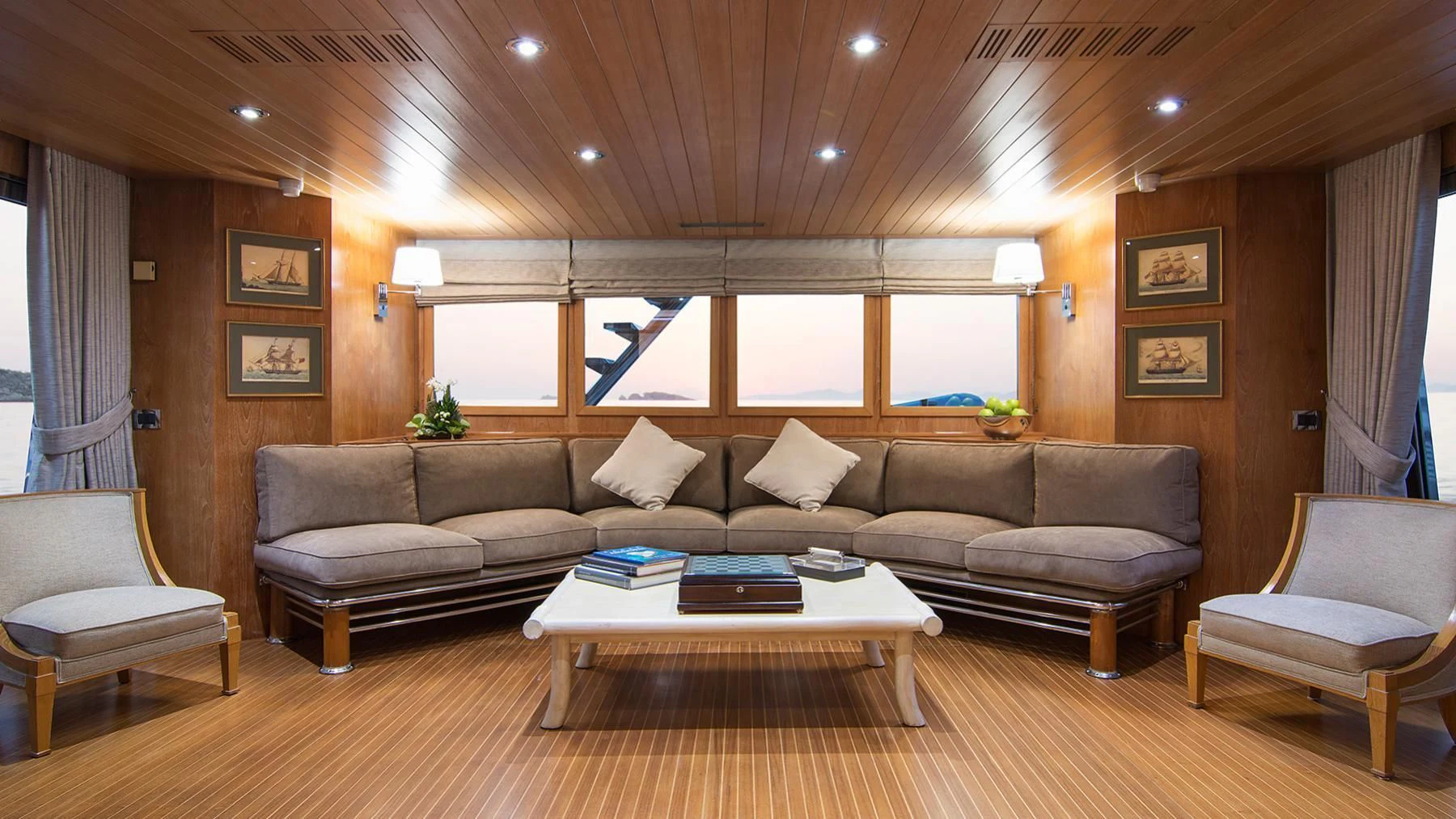 a living room with a couch and a coffee table aboard BELLA STELLA Yacht for Charter
