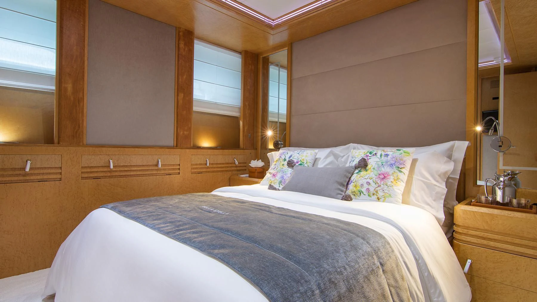 a bed with white sheets aboard BELLA STELLA Yacht for Charter