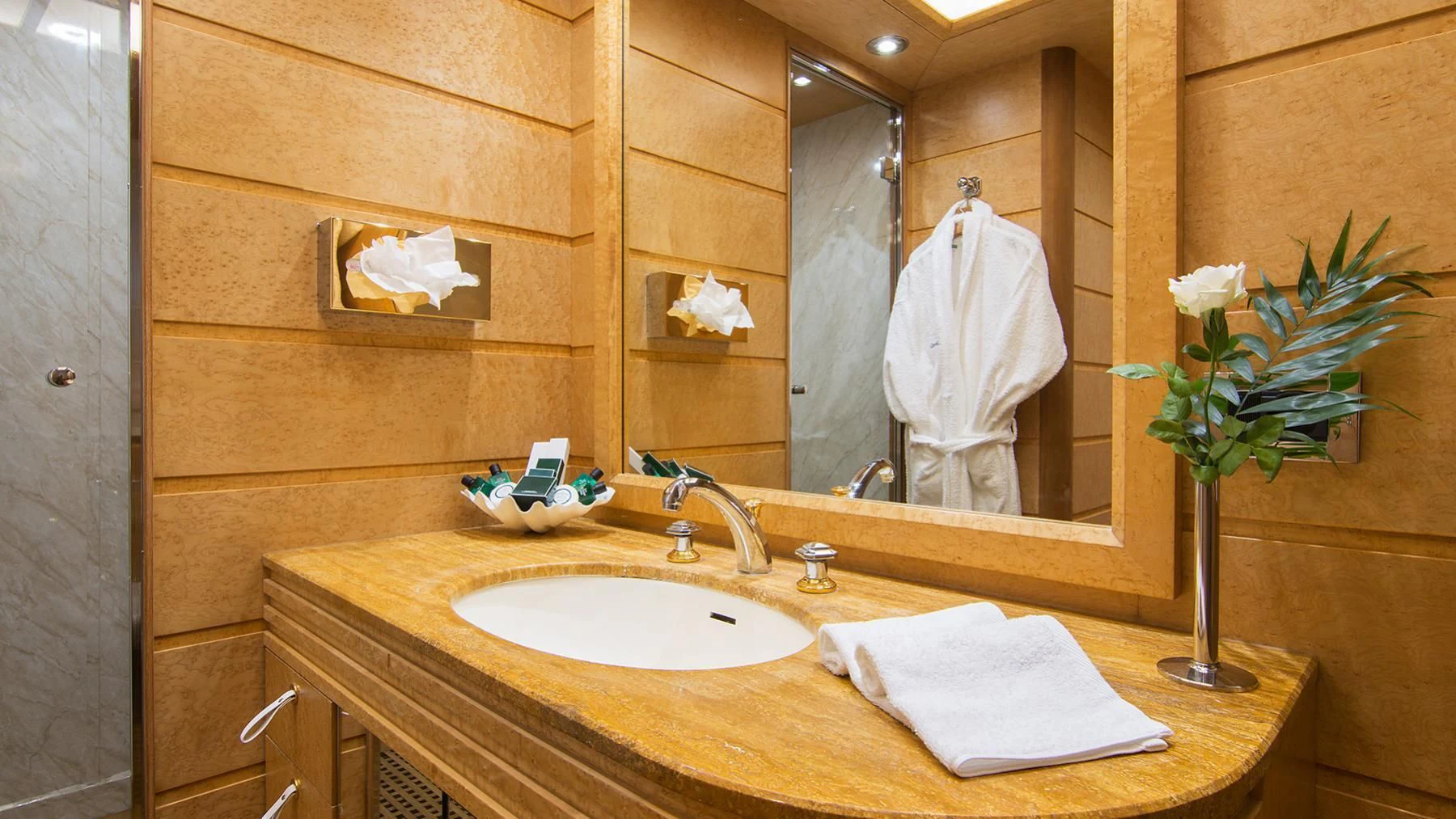 a bathroom with a large mirror aboard BELLA STELLA Yacht for Charter