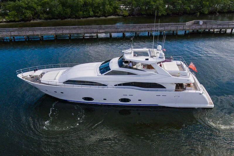 a white boat in a body of water aboard ALEGRA Yacht for Sale