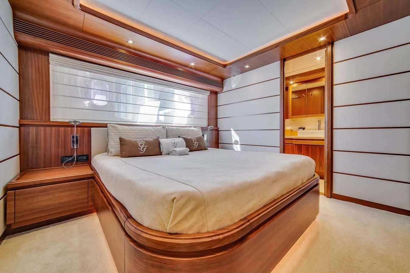 a large bedroom with a large bed aboard ALEGRA Yacht for Sale