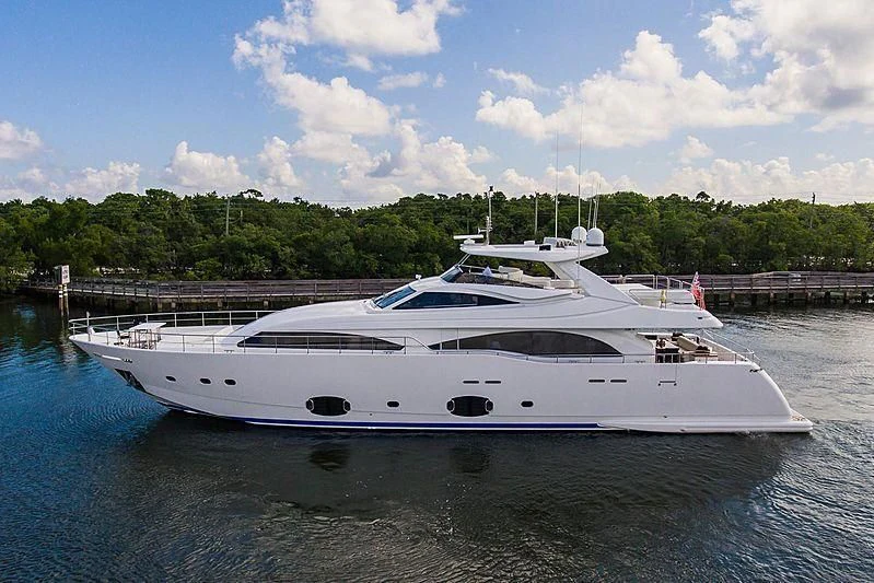 a white yacht on the water aboard ALEGRA Yacht for Sale