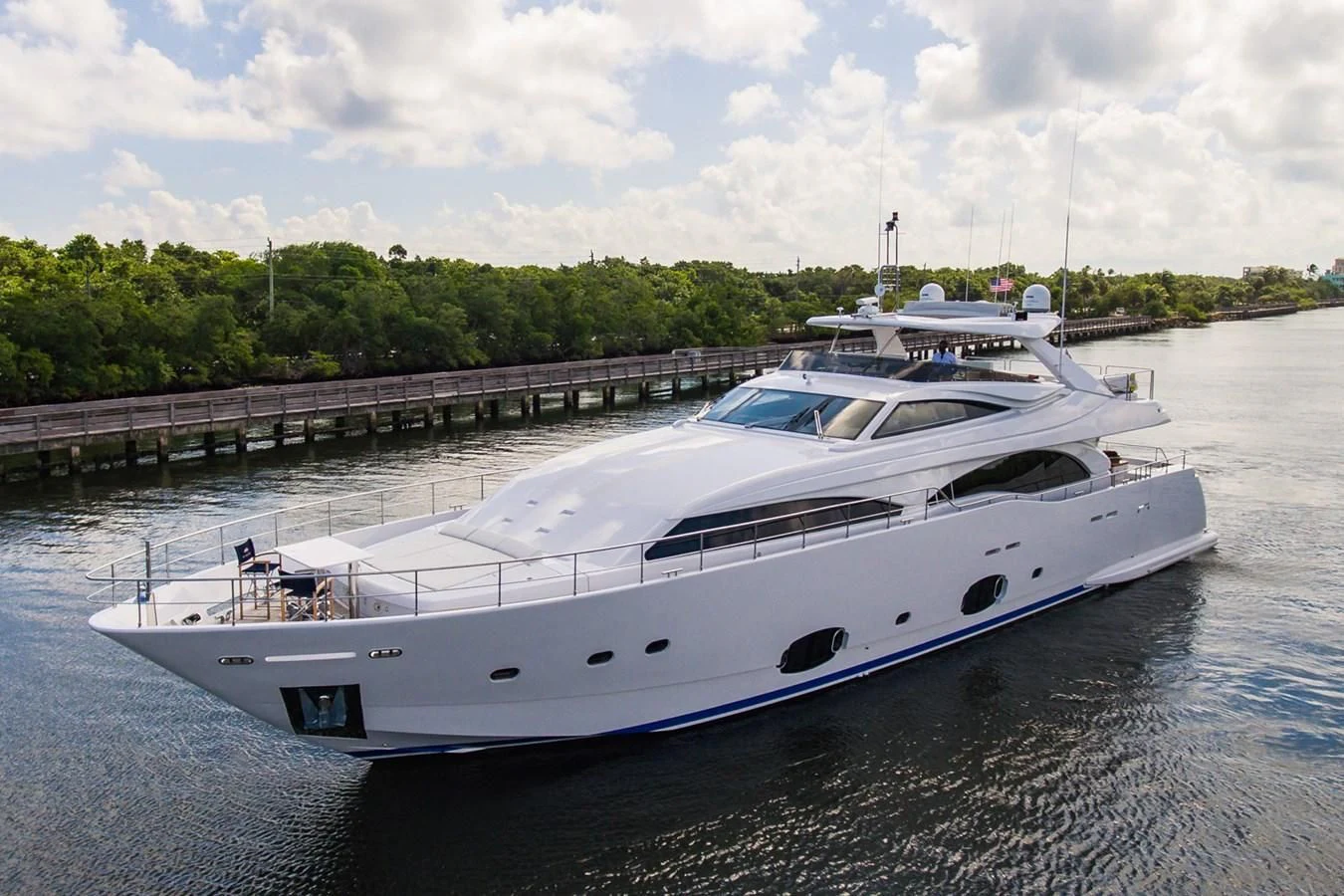 a white yacht on the water aboard ALEGRA Yacht for Sale