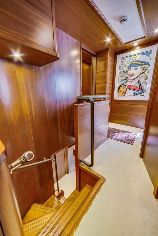 a bathroom with a wood wall aboard ALEGRA Yacht for Sale