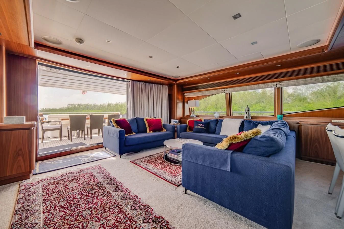 a living room with a couch and a rug aboard ALEGRA Yacht for Sale
