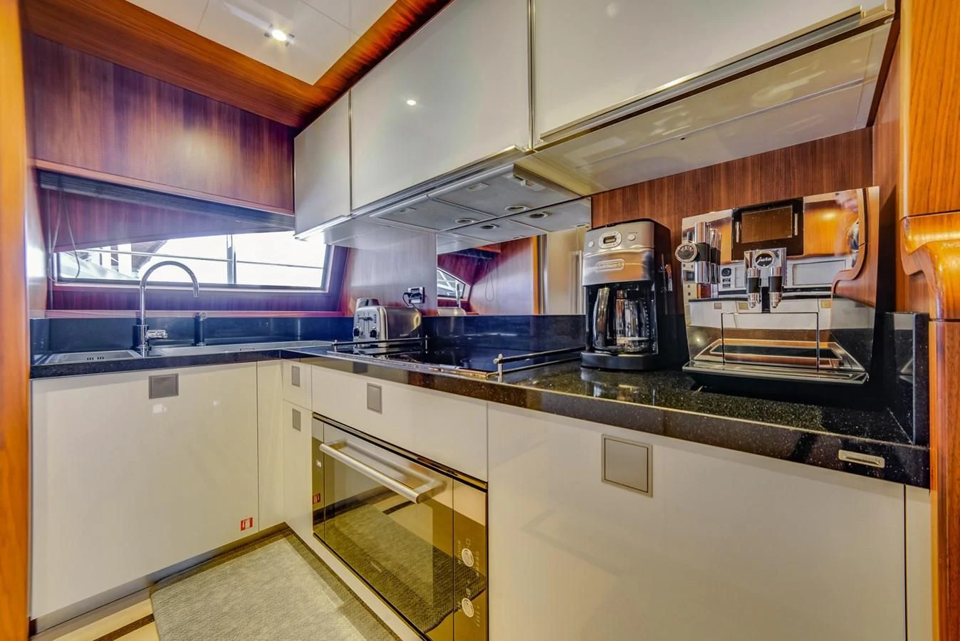 a kitchen with a coffee maker aboard ALEGRA Yacht for Sale