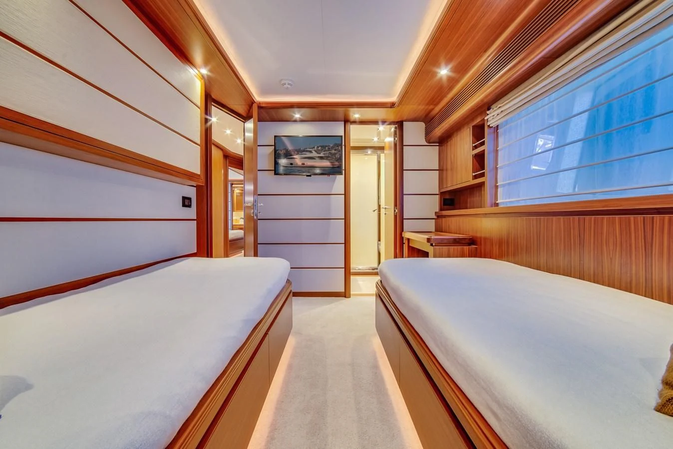 a room with two beds aboard ALEGRA Yacht for Sale