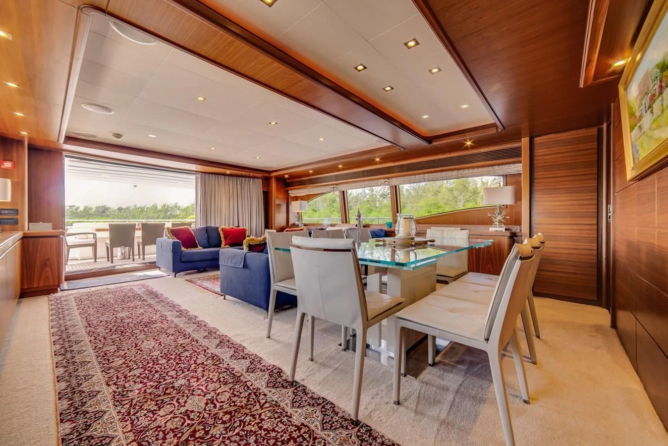 a large dining room with a table and chairs aboard ALEGRA Yacht for Sale