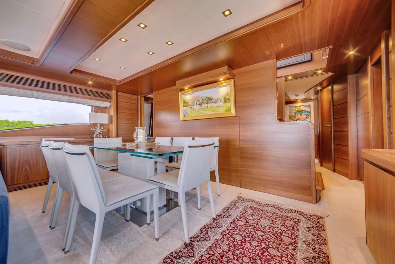 a room with a table and chairs aboard ALEGRA Yacht for Sale