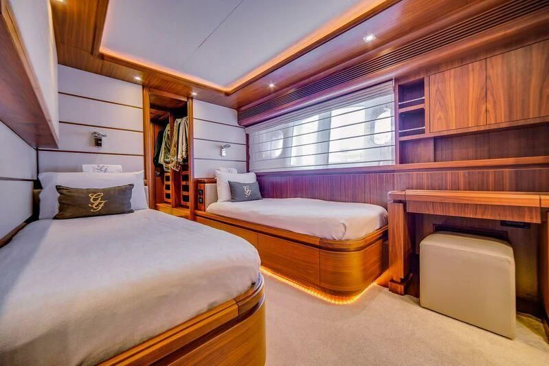 a room with two beds aboard ALEGRA Yacht for Sale