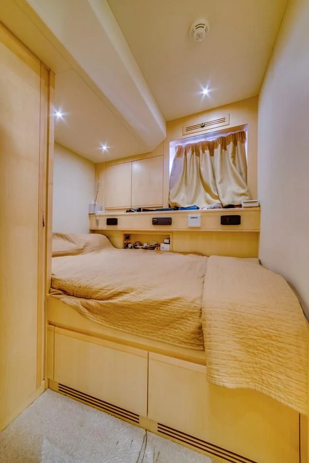 a bed in a room aboard ALEGRA Yacht for Sale