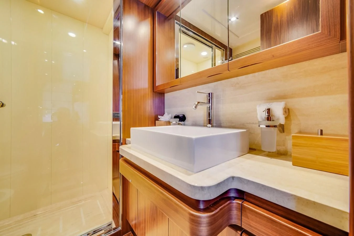 a bathroom with a sink and a mirror aboard ALEGRA Yacht for Sale