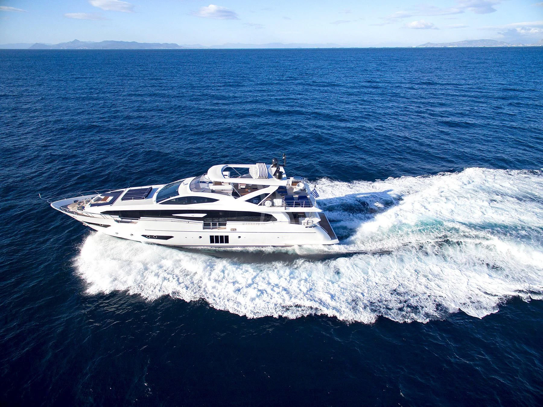 a boat on the water aboard MEMORIES TOO Yacht for Sale