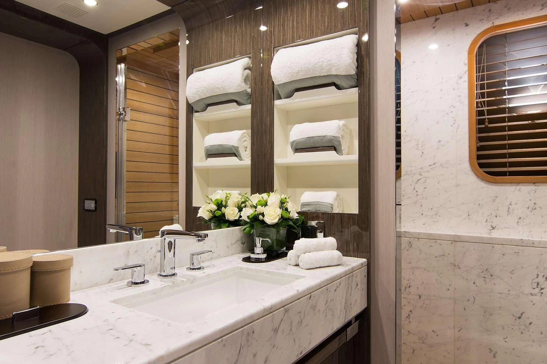 a bathroom with a large mirror aboard MEMORIES TOO Yacht for Sale