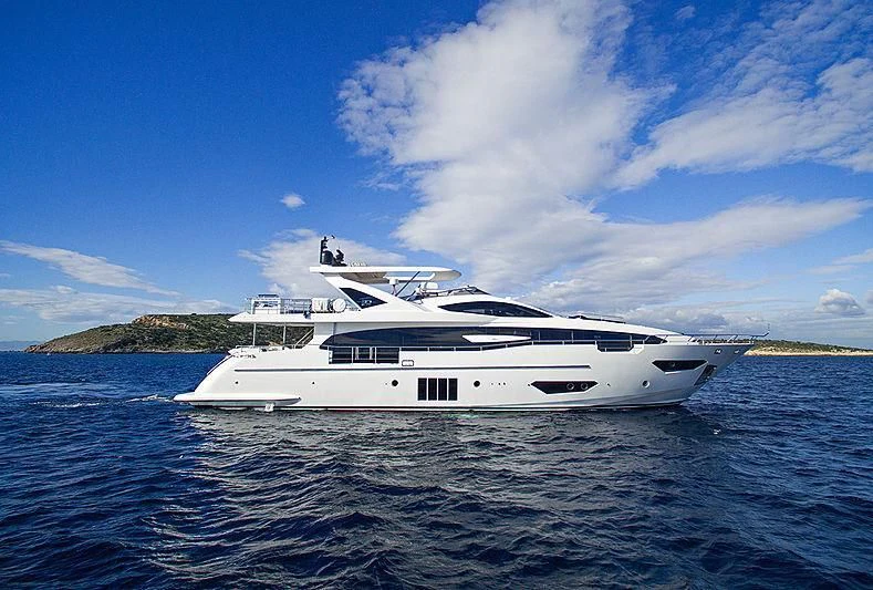 a white yacht on the water aboard MEMORIES TOO Yacht for Sale