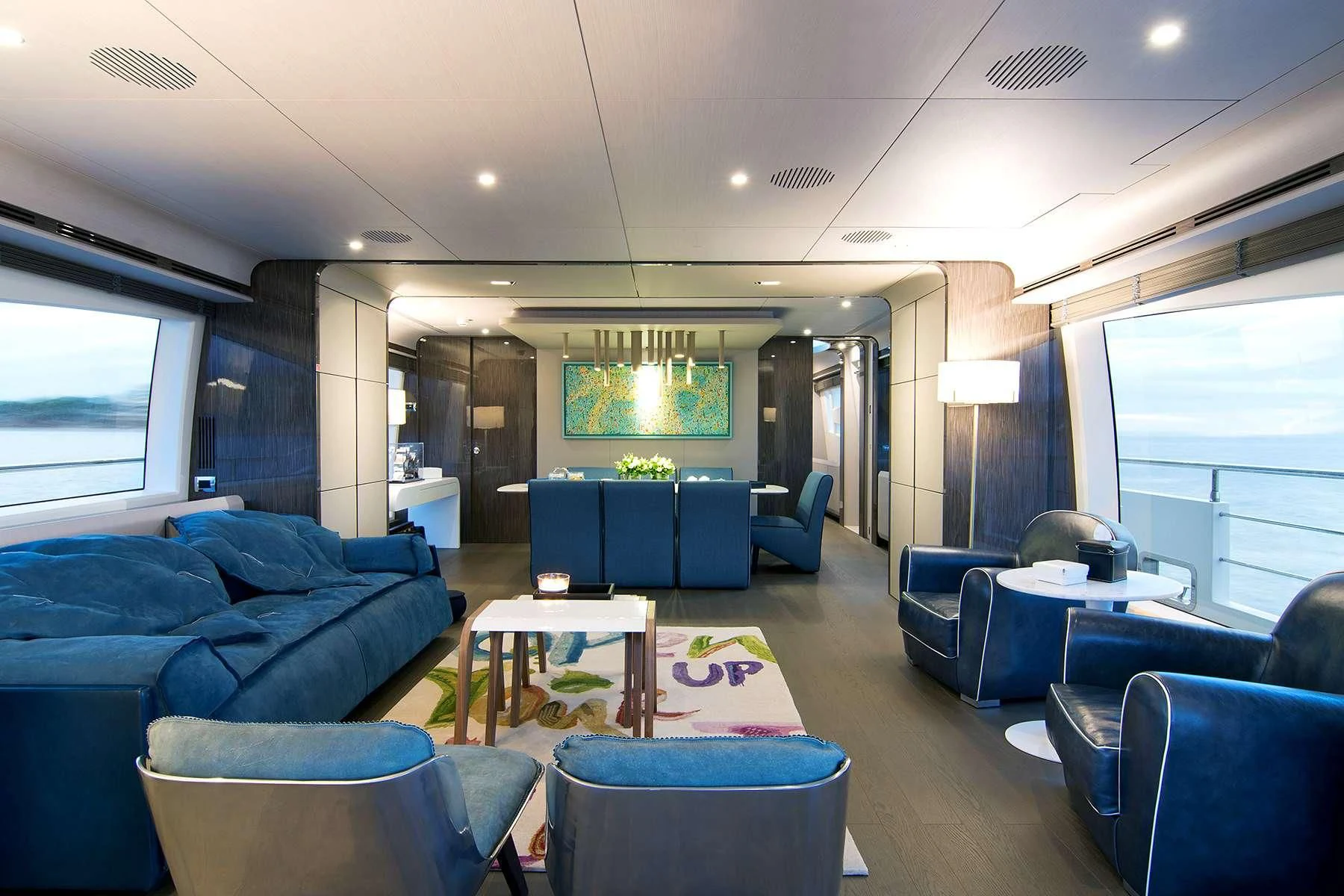 a room with a couch and a table aboard MEMORIES TOO Yacht for Sale