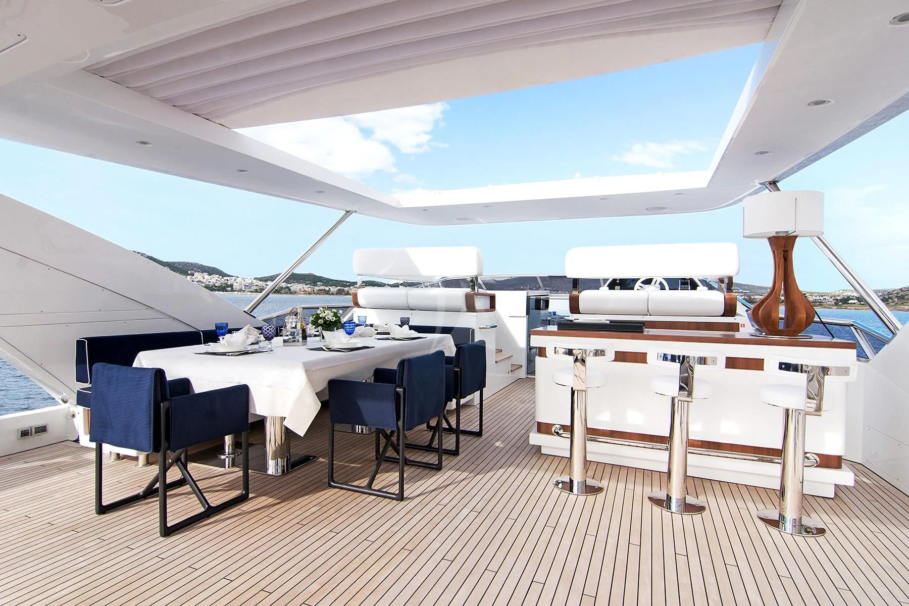 a room with a table and chairs aboard MEMORIES TOO Yacht for Sale
