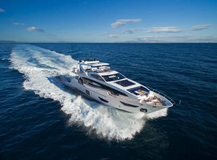a white yacht on the water aboard MEMORIES TOO Yacht for Sale