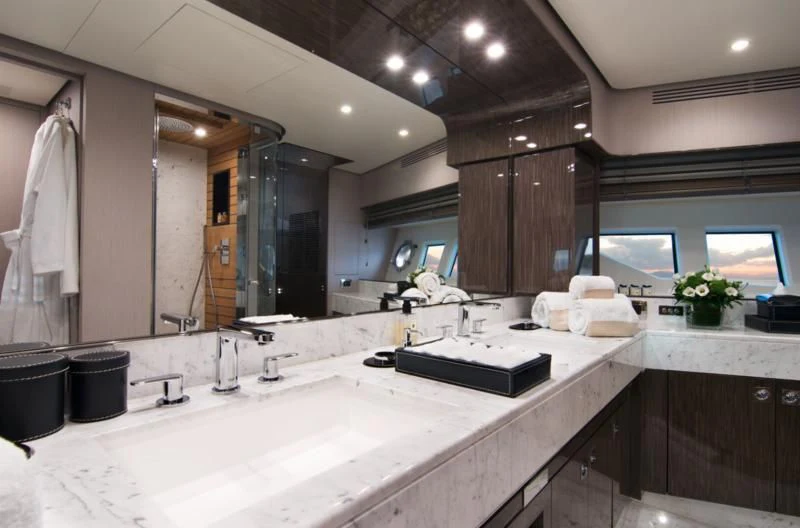a bathroom with a large mirror aboard MEMORIES TOO Yacht for Sale