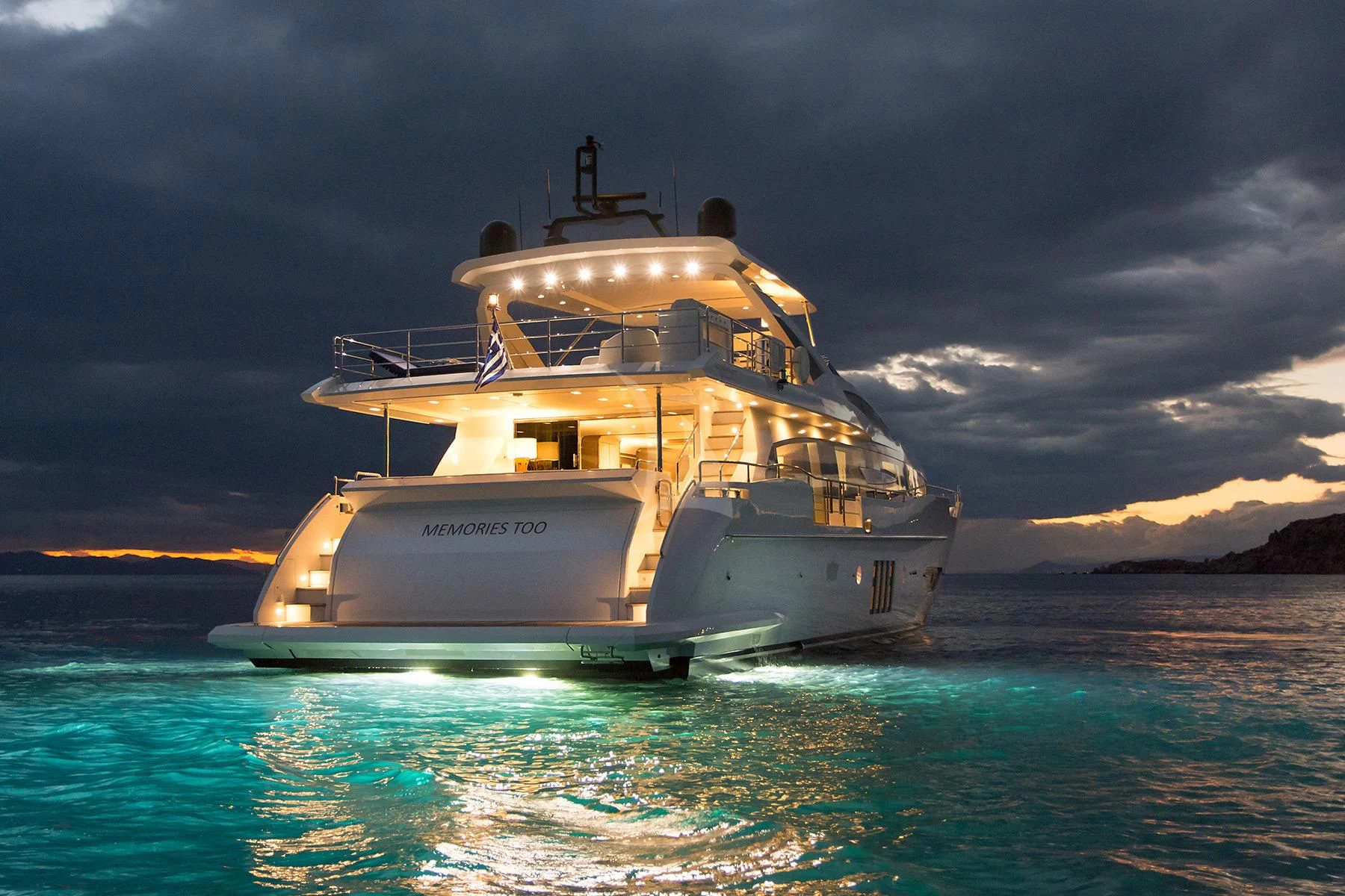a white boat in the water aboard MEMORIES TOO Yacht for Sale