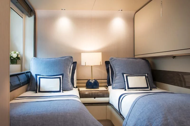 a couple of beds in a hotel room aboard MEMORIES TOO Yacht for Sale